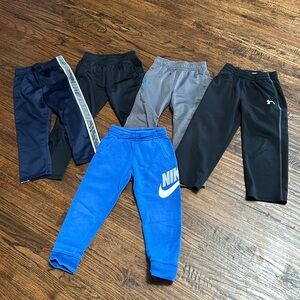5 pairs of pants.  Multi brand and color.  4t